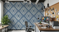 A small center motif holds the heart of every diamond on this slate blue boho wallpaper.