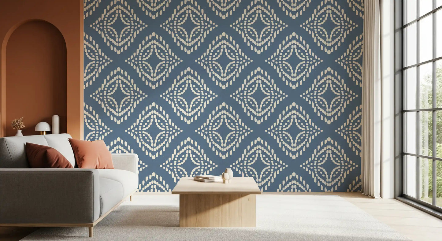 Cream marks balance a Living room beside this slate blue ornament wallpaper backdrop.