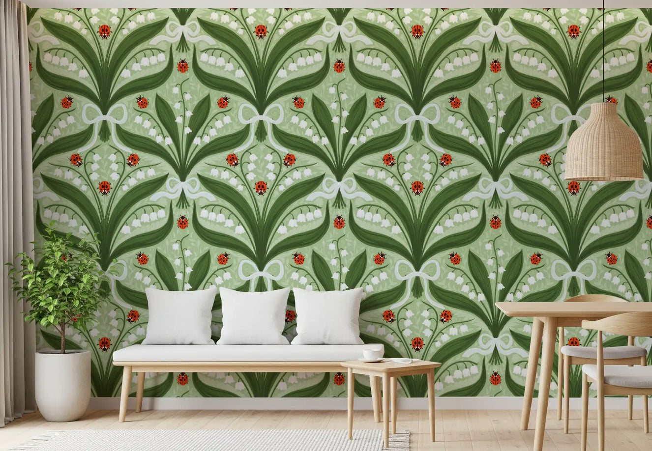 Lily flowers and ladybugs animate a dining room across this sage green wallpaper.