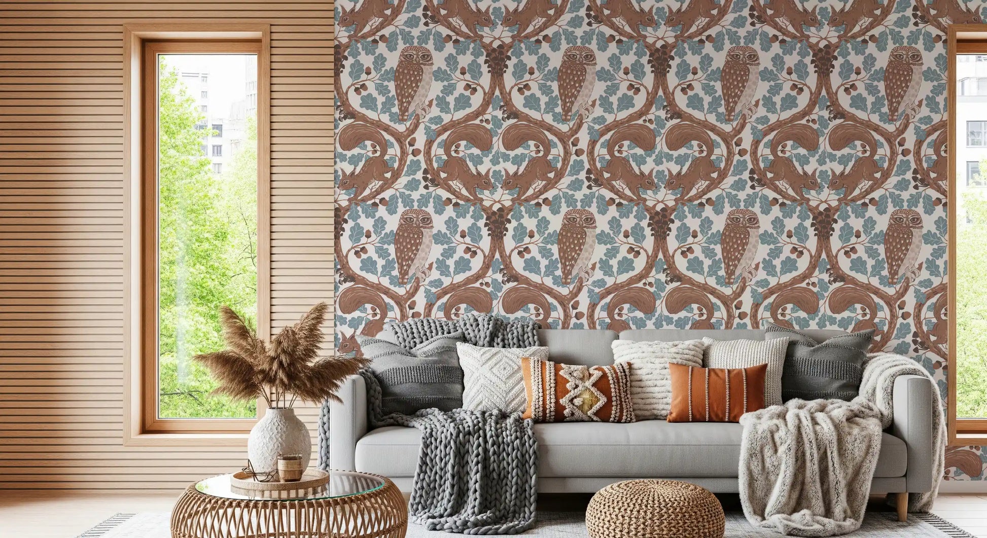 Curving brown branches loop into a family room from this blue oak owl wallpaper., GD9685