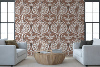 Coffee-toned squirrels frame the upper edges of this owls and oak wallpaper.
