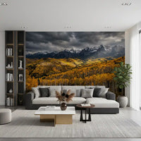 Mountain depth sweeps into a quiet lounge with this autumn golden embrace wall mural.