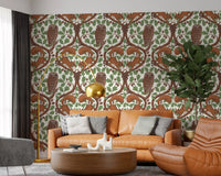 Owls and squirrels watch over a calm living room from this woodland wallpaper.