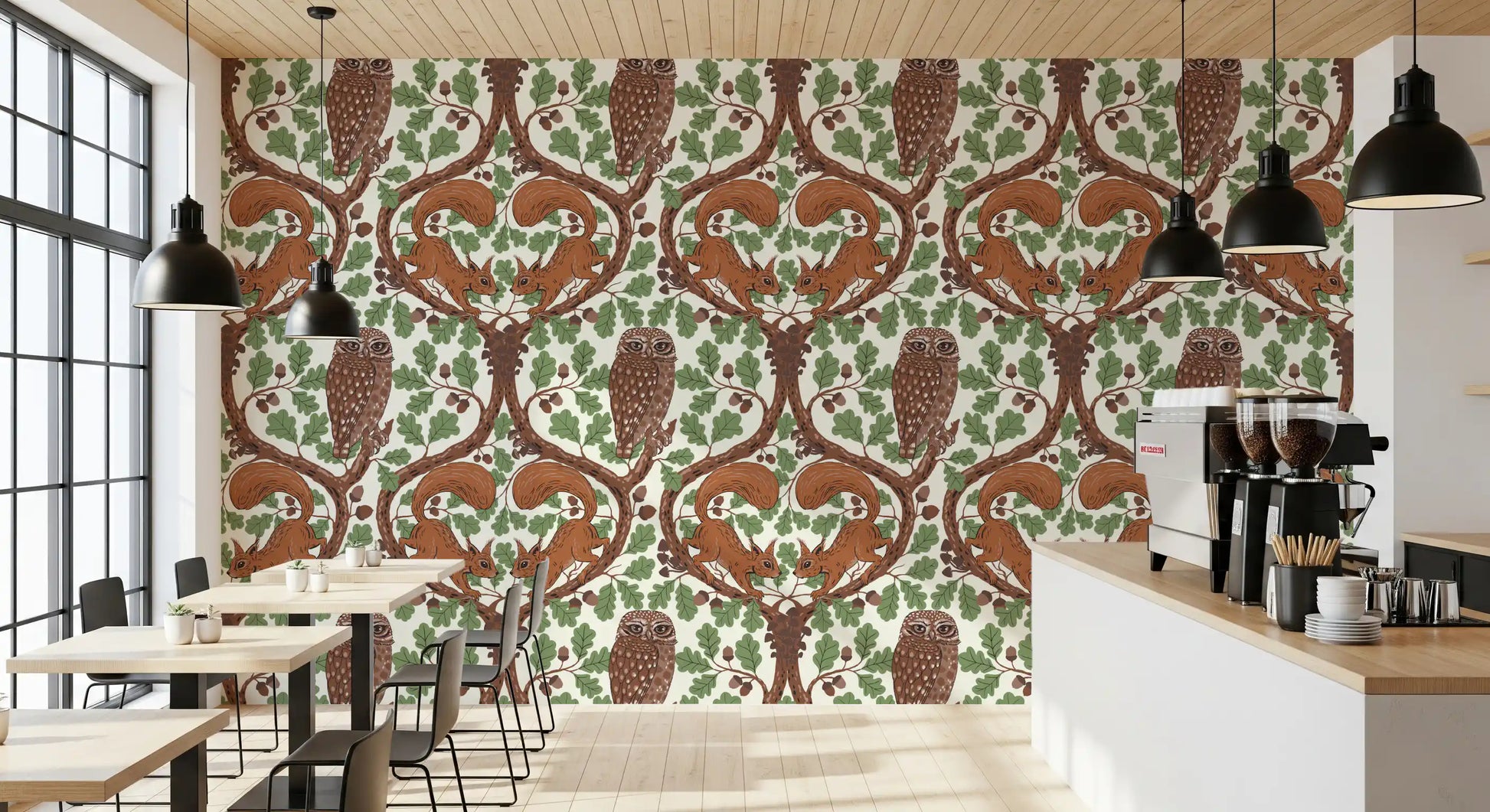 A Café area dining feels lived-in beside this woodland owl wallpaper.