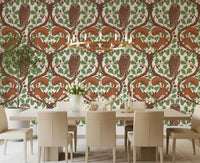 Woodland whispers wallpaper anchors a modern dining room with vintage storybook charm.