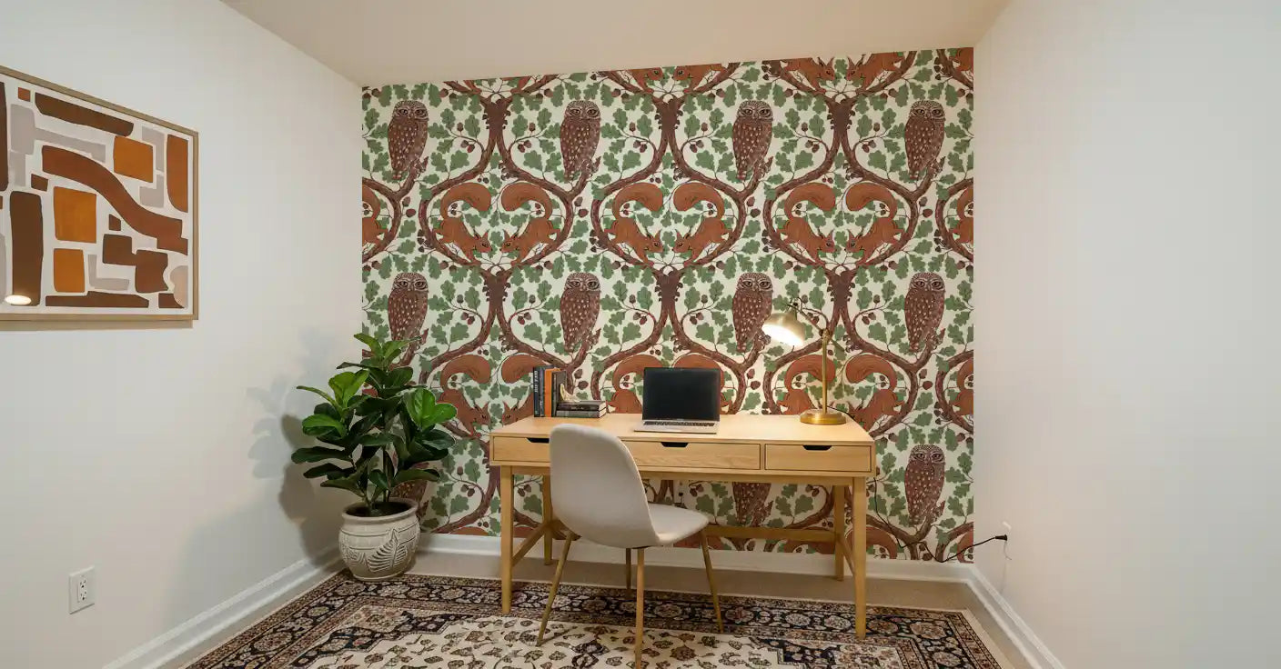 A Study room feels storybook-like beneath this woodland owls and oak wallpaper.