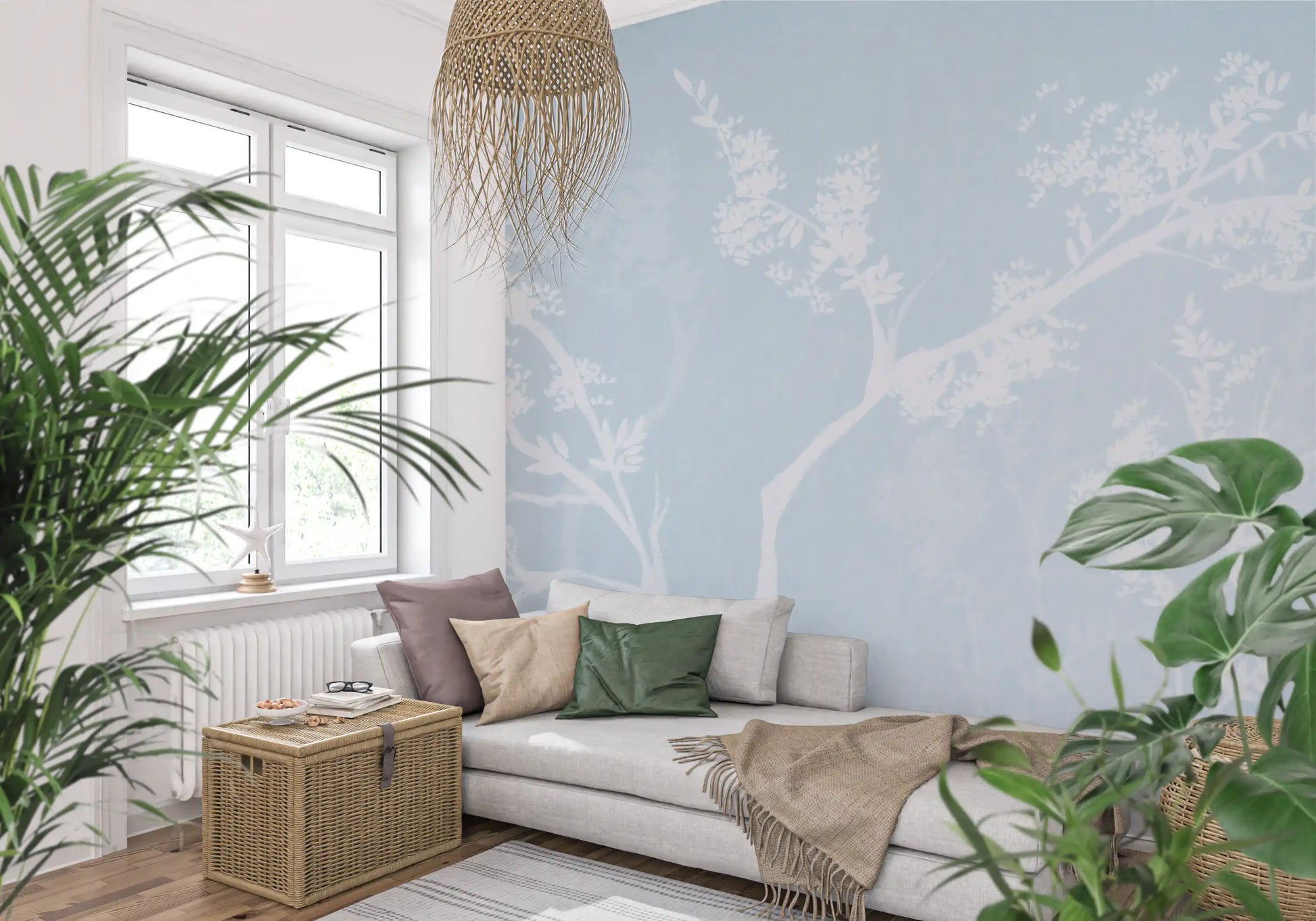 Powder blue background with white blossom tree silhouettes on this wall mural