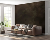 Moody woodland wall mural behind a white and minimal living room setting, GD9693