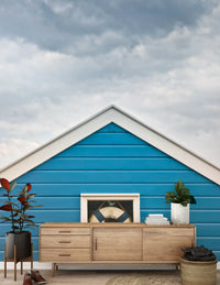 Beach hut gable wall mural placed in an arched lounge area