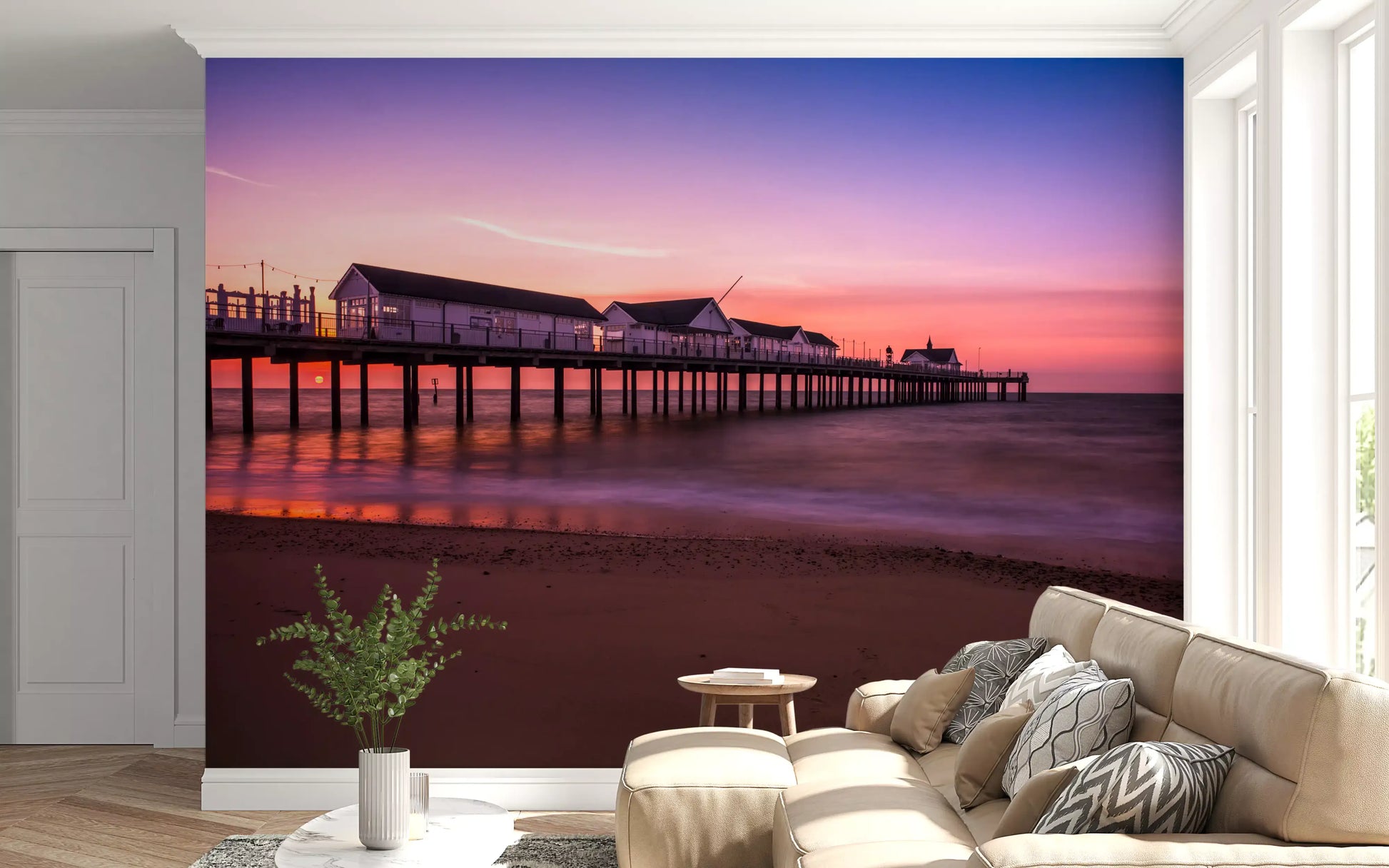 Silky ocean water and sandy shore in pier reverie wall mural scene