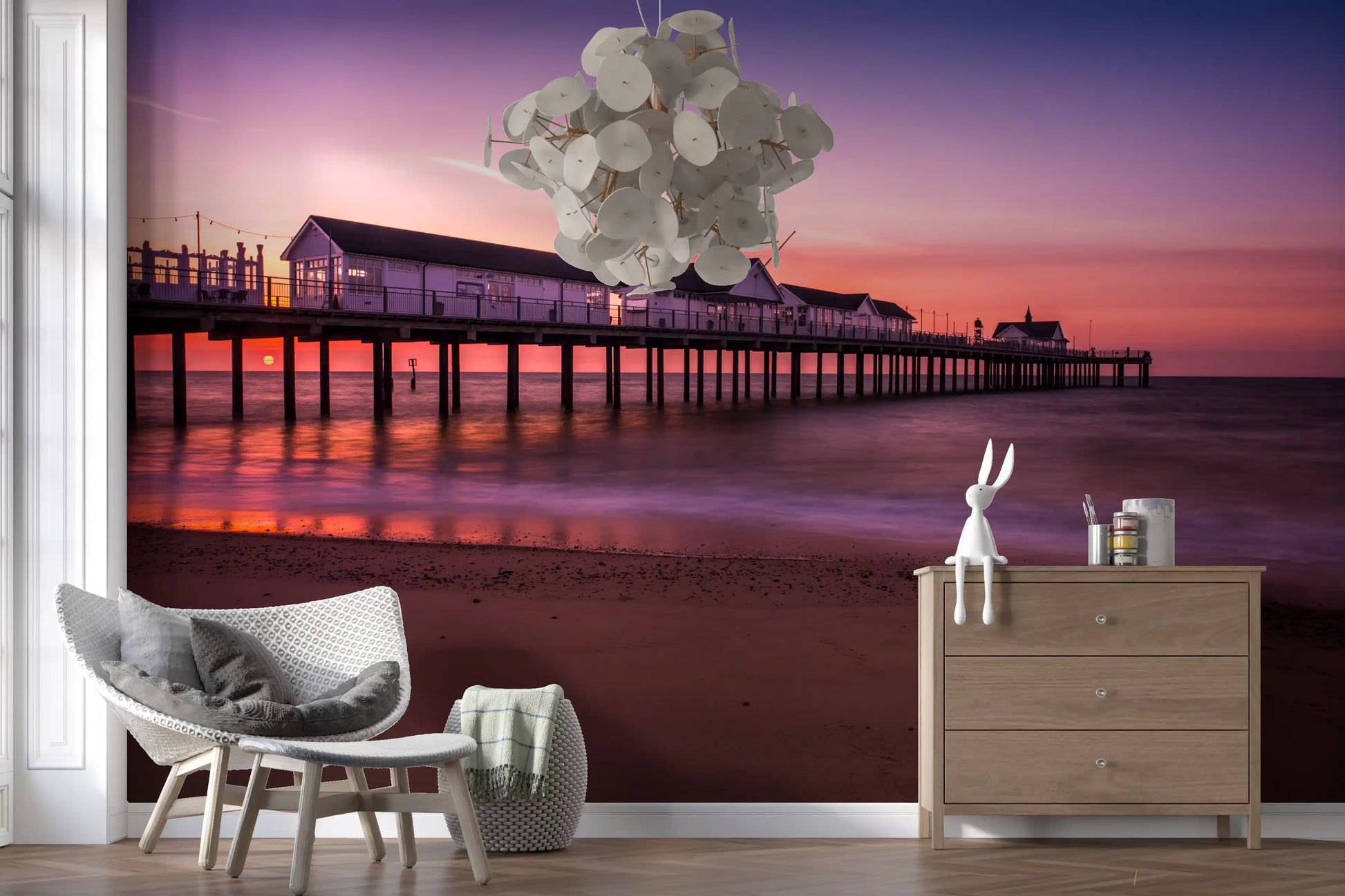 Open plan living area pier reverie wall mural golden hour seascape
