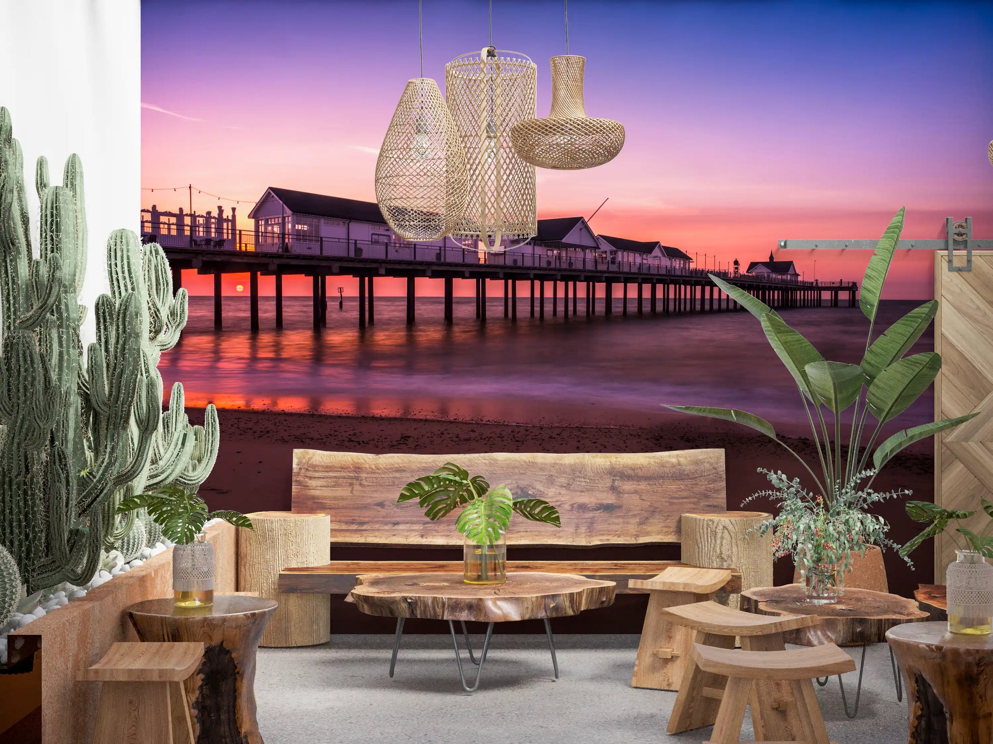 Rustic dining area with sunset pier reverie wall mural warm amber and purple glow
