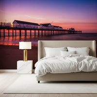 Sunset pier reverie wall mural purple violet sky over calm ocean water