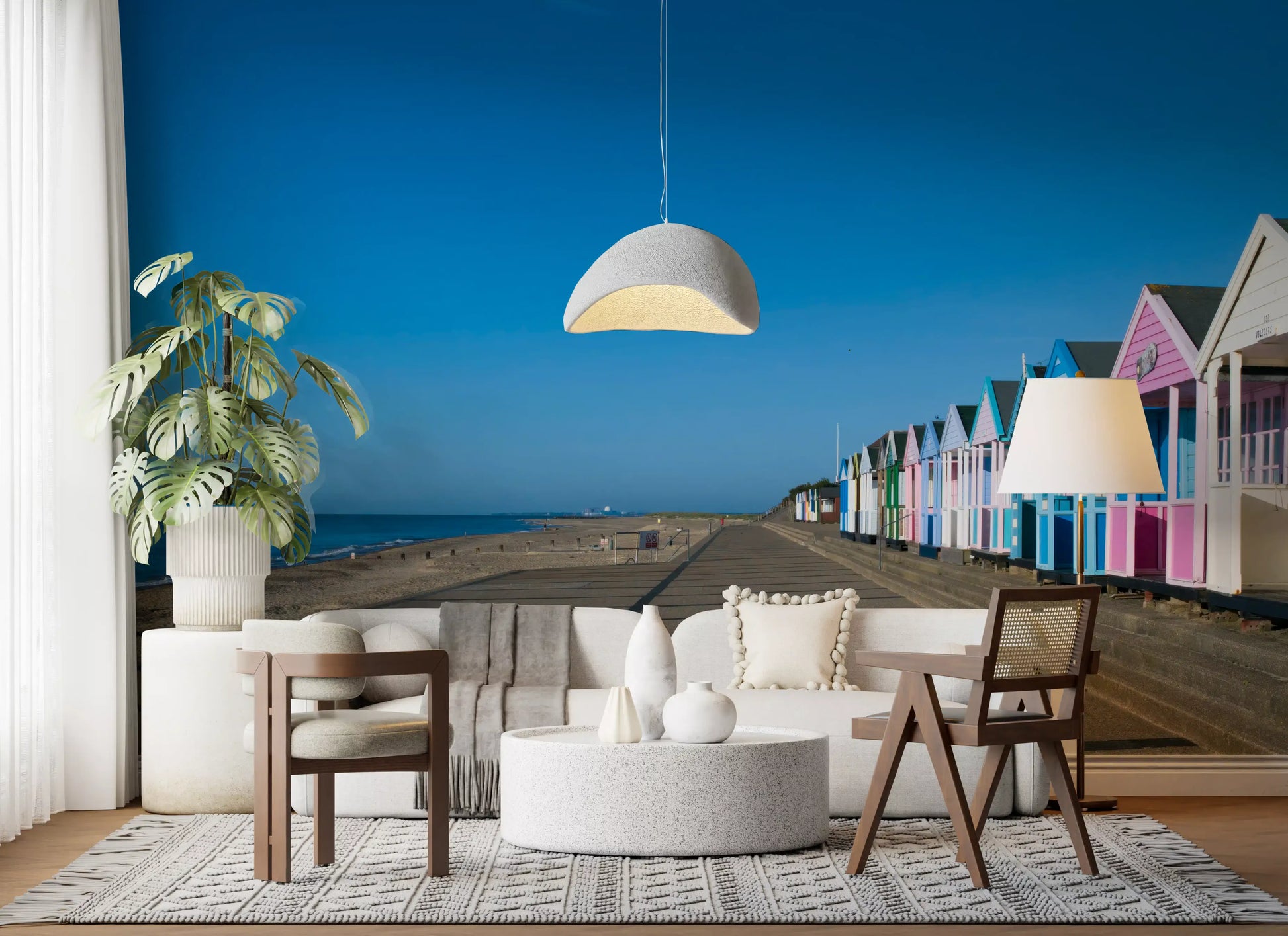 Bright blue sky above multicolor beach huts in wide coastal wall mural, GD9711