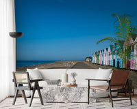 Pastel beach huts lining a sun-washed promenade in coastal wall mural, GD9711