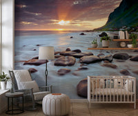 A Nursery whisks away with this coastal sunset serenity wall mural scene.