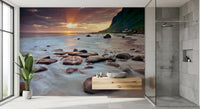 Sunset hues gild a bathroom with this coastal serenity wall mural.