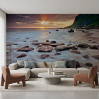 A modern living room basks in this coastal sunset serenity wall mural glow.