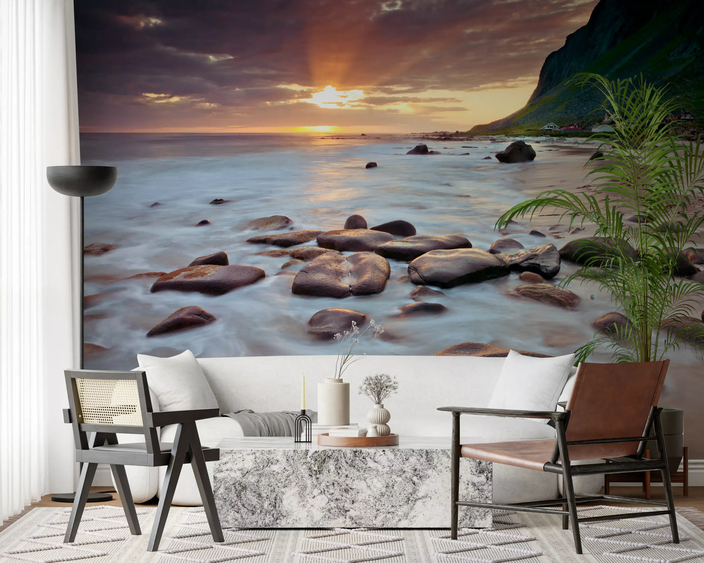 Surf foams over stones on this coastal sunset serenity wall mural sample.
