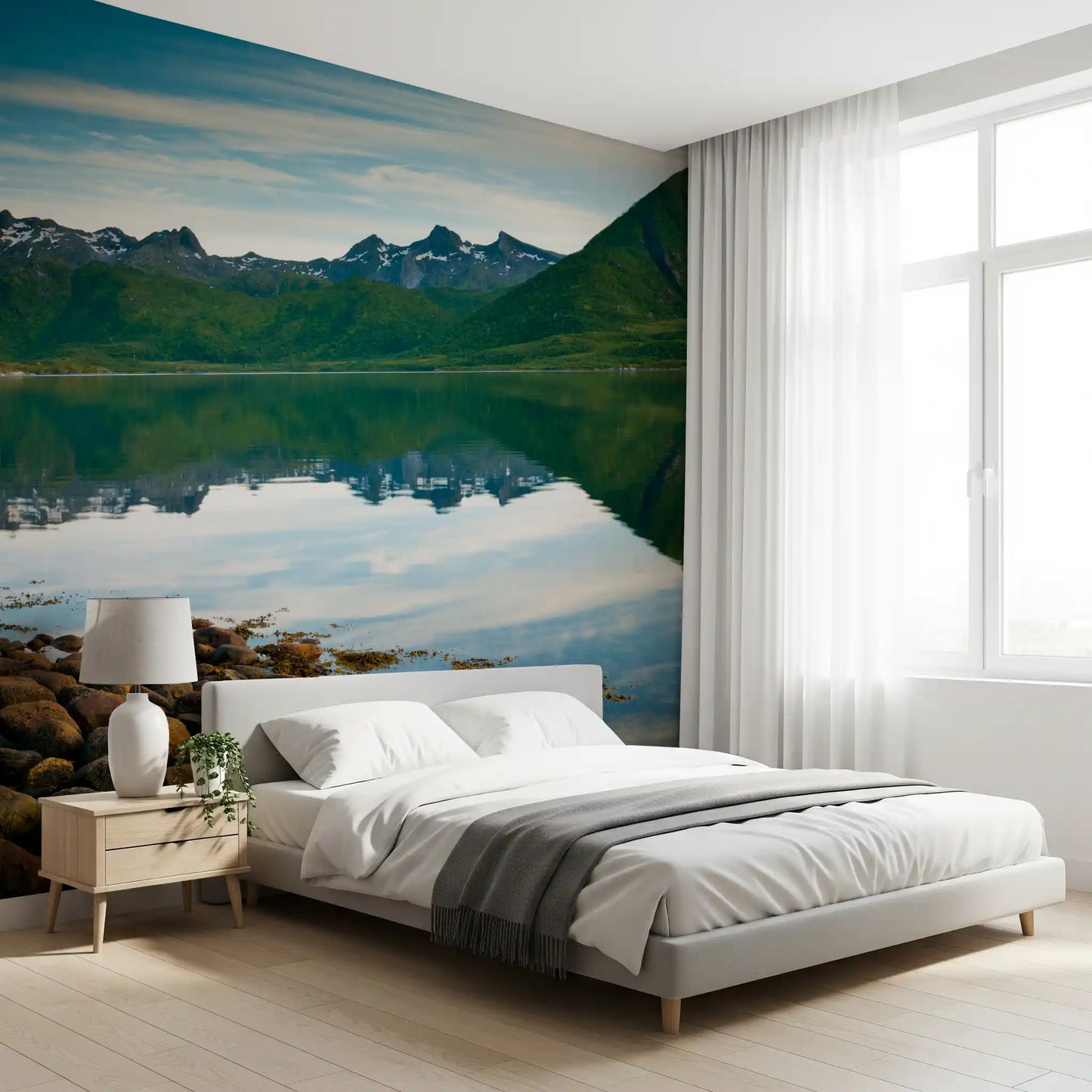 Snow-tipped emerald ridges line the horizon on this mirror waters wall mural.