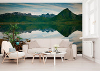 Reflection of emerald peaks spans the mirror still waters in this scenic wall mural.