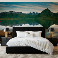 A Bedroom transports outdoors with this emerald peaks mirror waters wall mural.