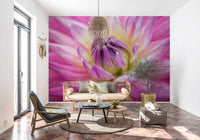 Pink dahlia petals layer outward on this vibrant blossom wall mural.