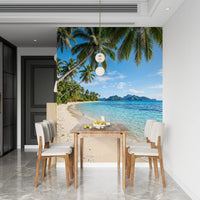 Palm fronds arching over white sand in the Tropical Beachside Serenity wall mural, GD9720