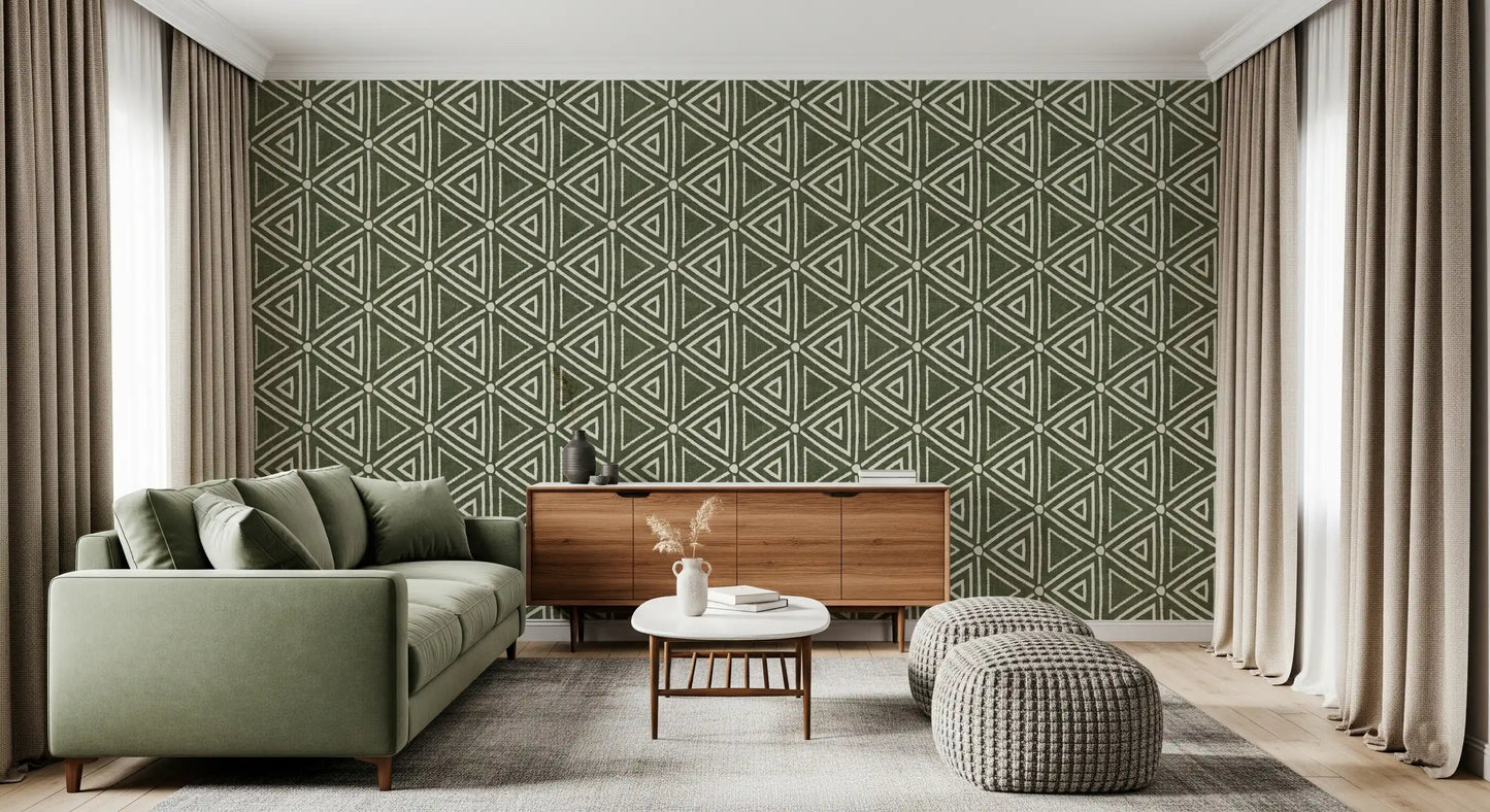 Layered geometric mudcloth wallpaper in sage green running through a lounge, GD9723