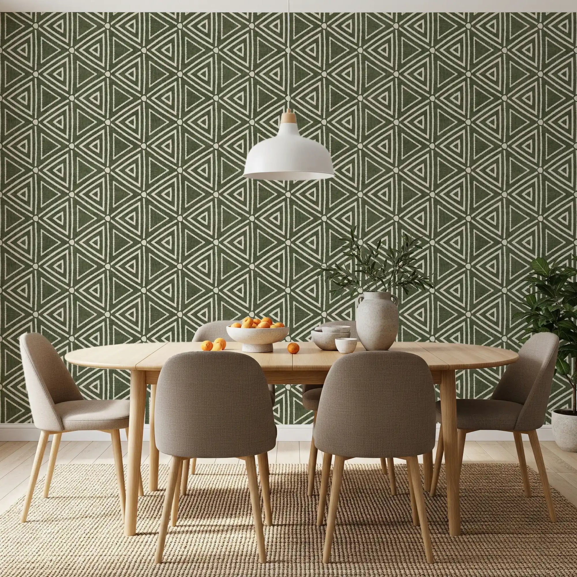 Moss green mudcloth triangle wallpaper covering a dining room in earthy sage tone, GD9723