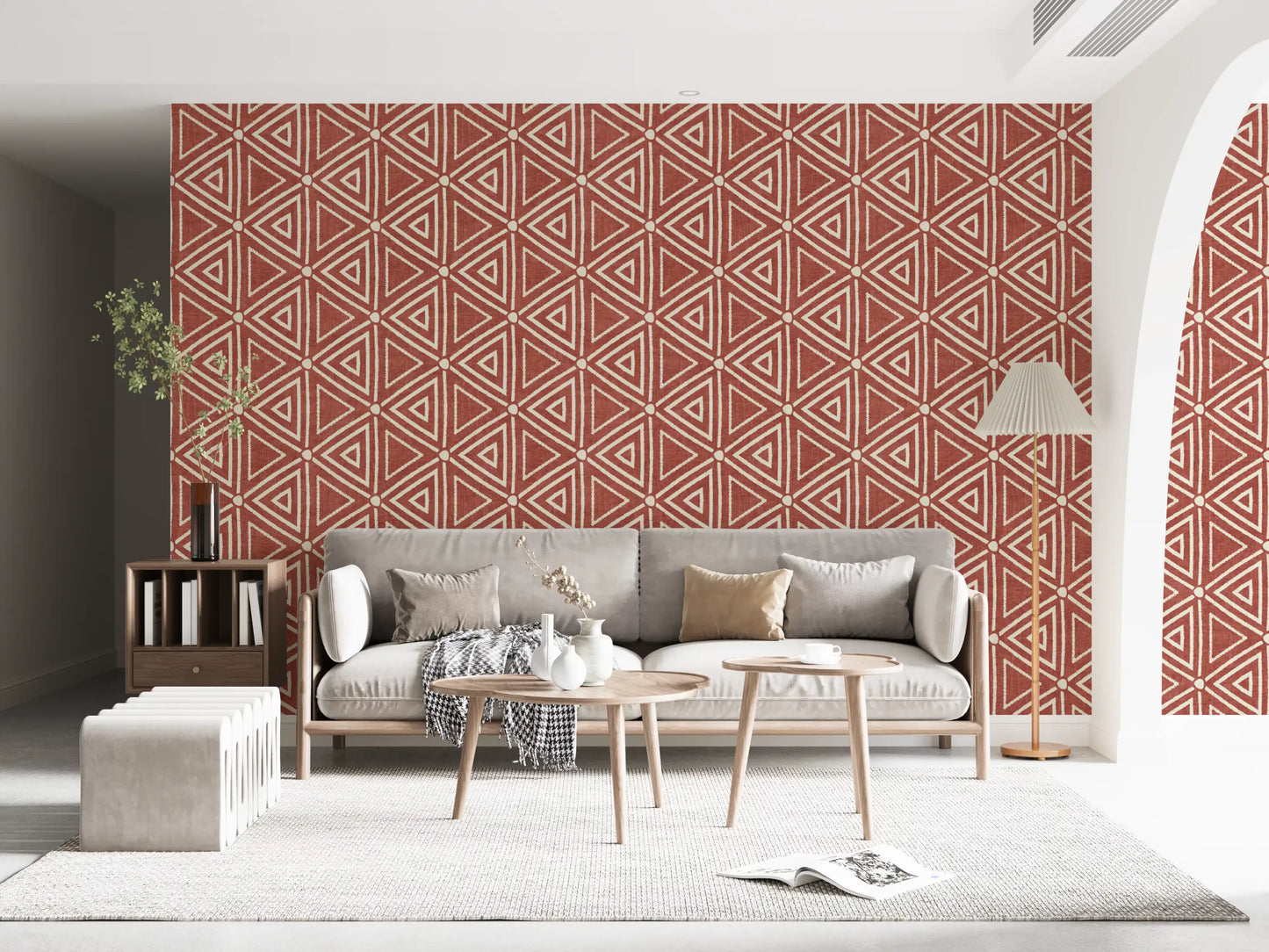 Rich red-orange ground anchors a lounge through this mudcloth triangle wallpaper., GD9724