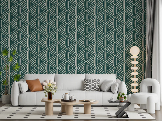Mudcloth teal triangle wallpaper filling a living room with bold geometric coverage