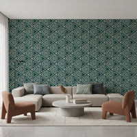 Teal boho mudcloth wallpaper wrapping a lounge in a deep geometric pattern, GD9725