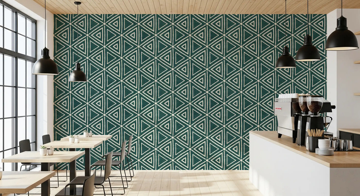 Rough-edged triangle motifs running across the boho teal mudcloth wallpaper, GD9725