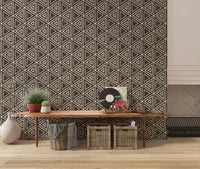 Mudcloth geometric wallpaper lining a hallway area in rich dark umber