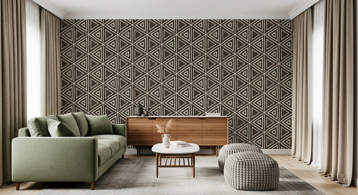 Textured umber boho wallpaper lining a lounge with geometric triangles