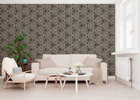 A living room showing the umber triangle mudcloth wallpaper in full detail