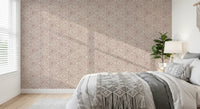 Cosy bedroom area  gain mud cloth charm from this boho triangle wallpaper.
