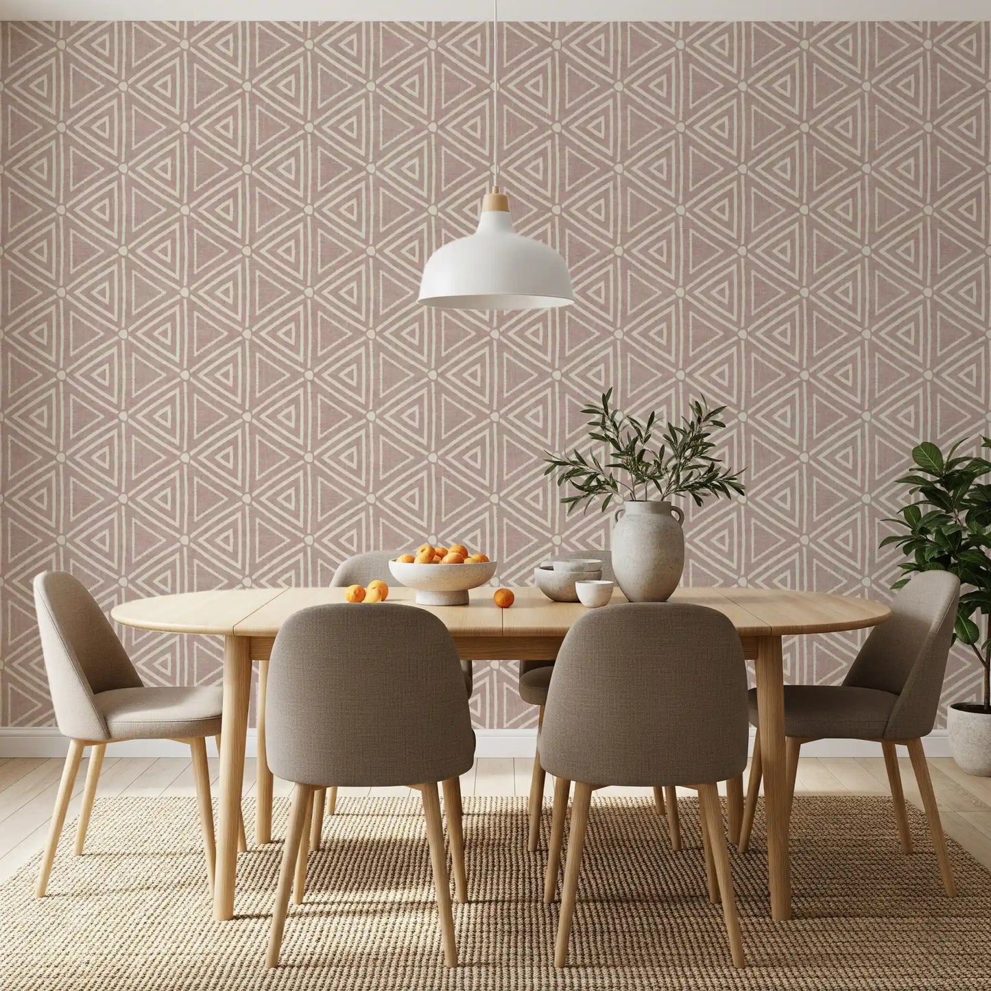 Imagine a relaxed dining room layered with this boho mudcloth triangle wallpaper.
