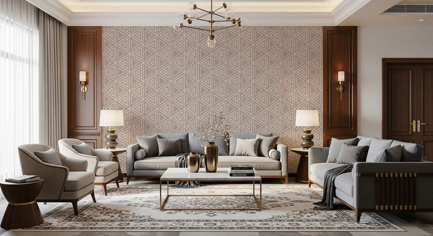 Cream triangles tile a dusty rose ground in this boho mudcloth wallpaper.