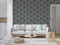 Worn-edge triangles and intersection dots fill out the Mudcloth wallpaper repeat.