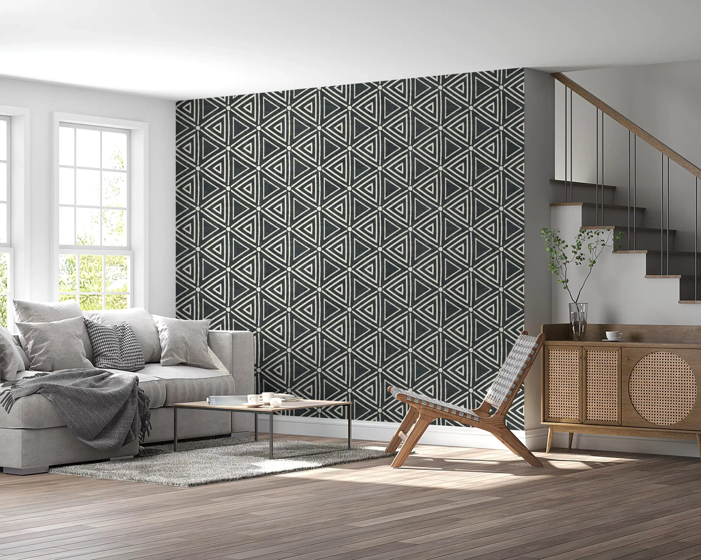 Cream triangles arranged in mirrored rows across a charcoal Mudcloth Geometric wallpaper.