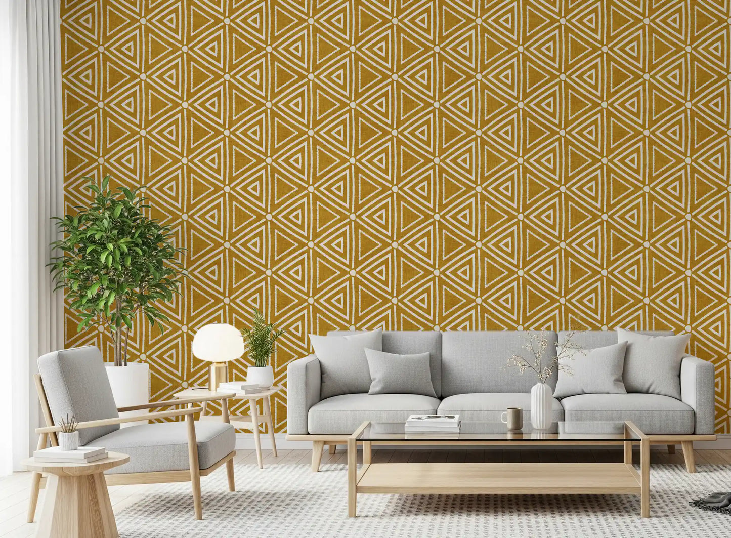 Living room set against textured triangle wallpaper in warm boho yellow.