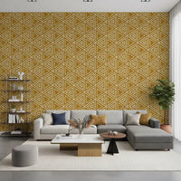 Triangle shapes line up in tight rows on this bold mustard yellow wallpaper.