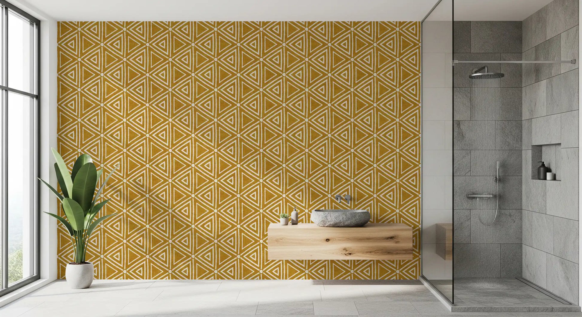 Mustard mudcloth wallpaper textured with irregular geometric triangles and dots.