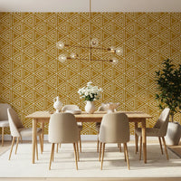 Dining room textured by the boho triangle wallpaper in deep mustard yellow.