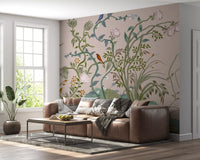 A bright sitting room scaled around the chinoiserie vine wall mural.