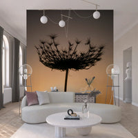 Living room scenes brighten beside this sunset seed head silhouette wall mural.
