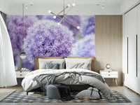 Bedrooms wake gently around a purple floral orb wall mural in lavender bloom.