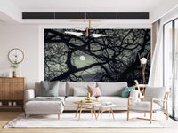 Atmospheric moon and branches wall mural on a living room with greenery, GD9749